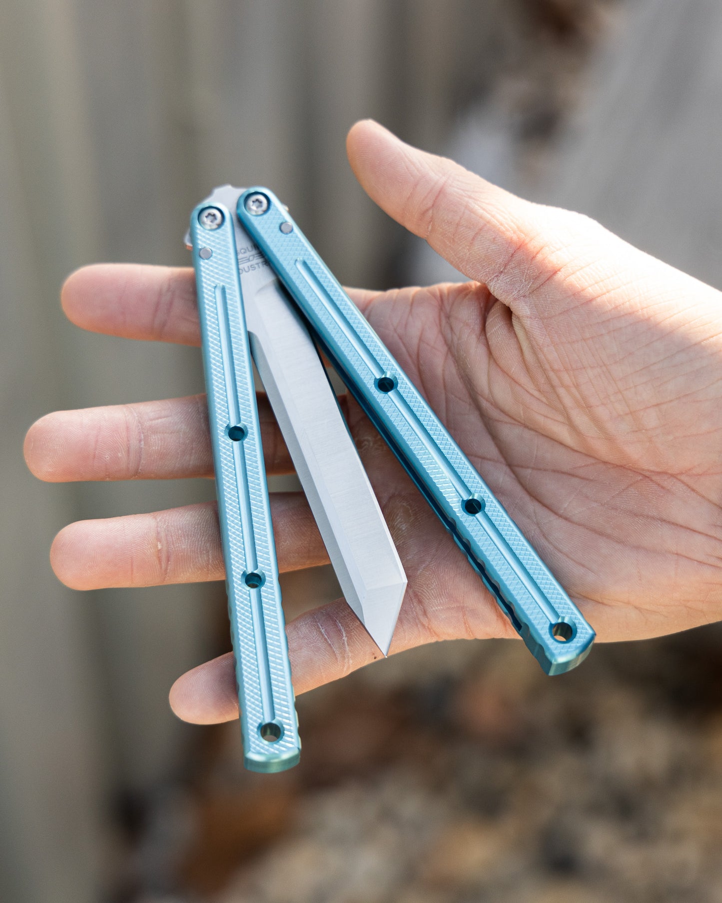 Glacier Tanto Krake Raken Semi Closed Position On Hand Blurry Background
