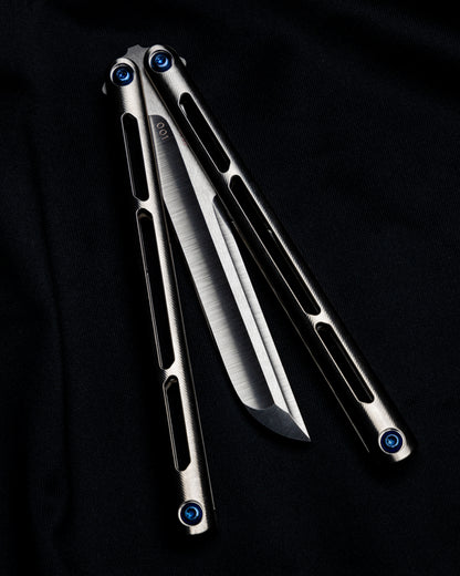 AMKW Satin Tsunami half open on black cloth