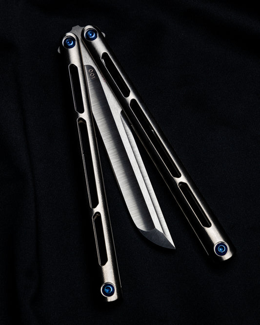 AMKW Satin Tsunami half open on black cloth