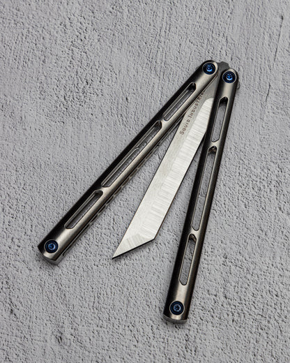 AMKW Tsunami Tanto Half Open on Gray Surface