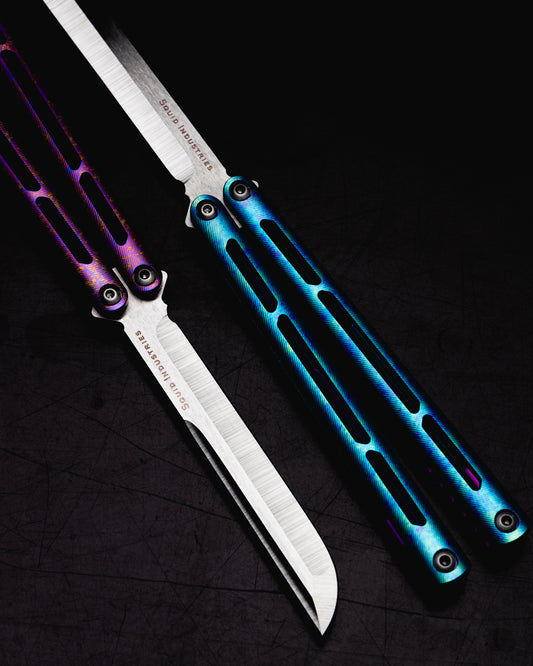 Anodized AMKW Tsunami Blue and Purple Side By side