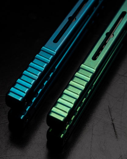 Anodized Madko Tanto Handle Close Up Side By Side Black Background