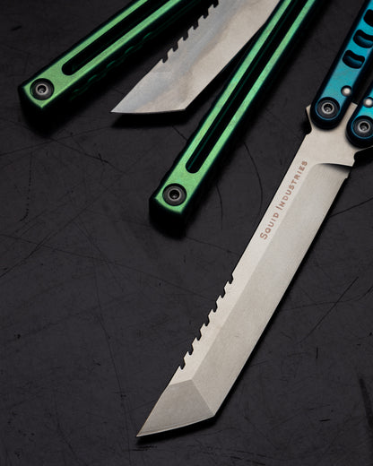 Anodized Madko Tanto Handle Close Up Side By Side Black Background