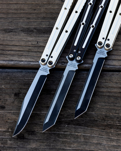 Tanto Silver, Tanto DT Black, Bowie Silver on wooden table