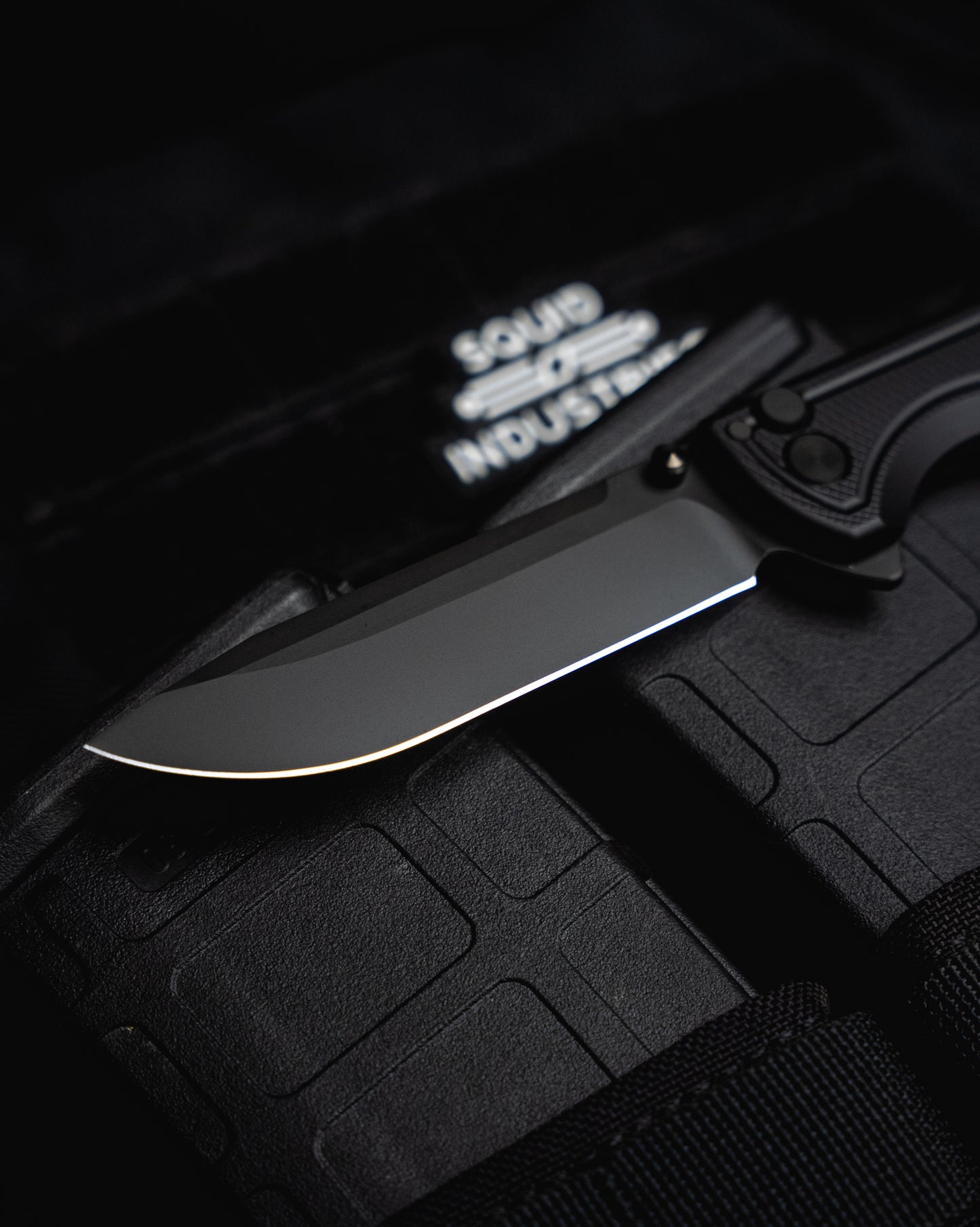 DLC Surf On Black Mag and Squid Industries logo in the background. 