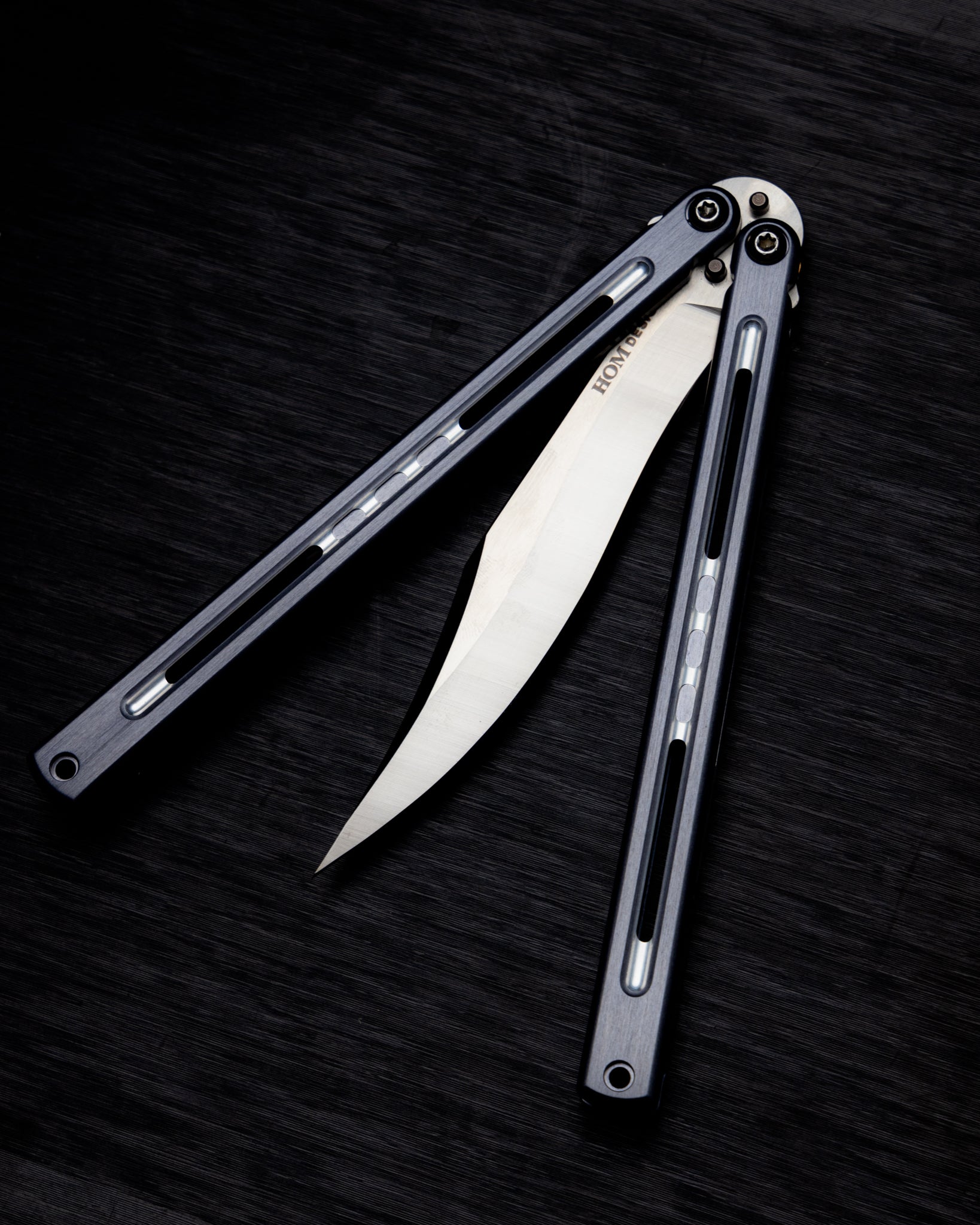 Mutalisk Gunmetal Half Open on dark background